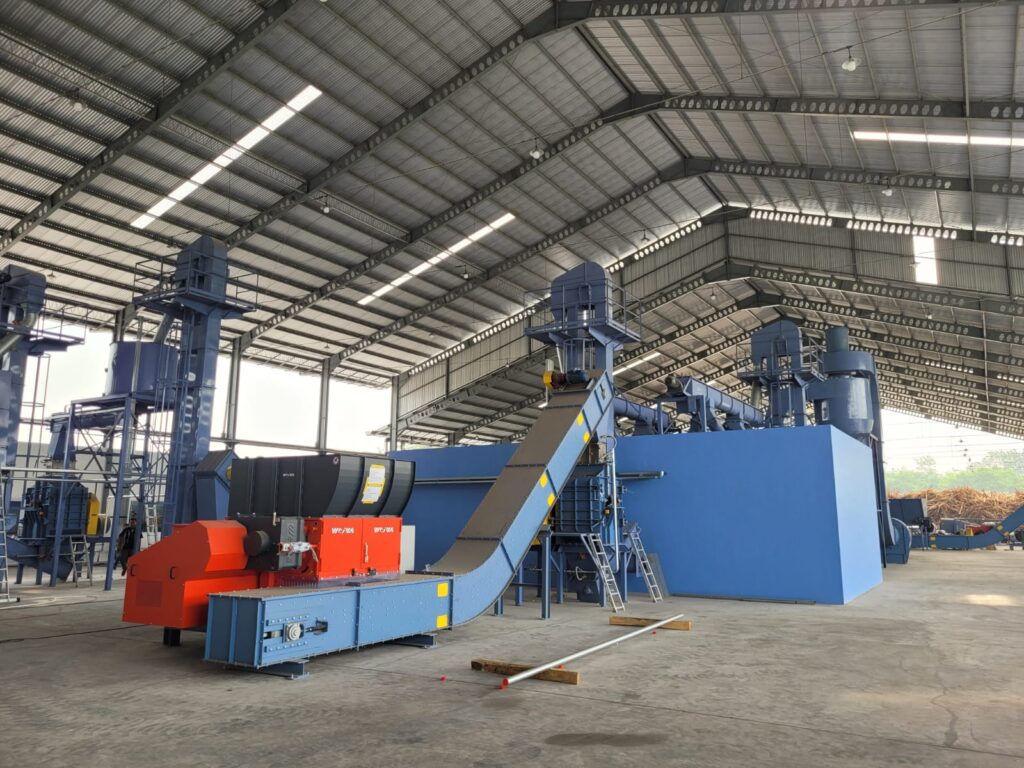 rębak marki Weima do rozdrabniania odpadów drzewnych, linia suszarnicza, podajniki łańcuchowy do transportu zrębki z rębaka do syszarni