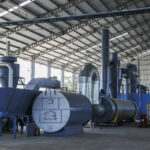 rębak marki Weima do rozdrabniania odpadów drzewnych, linia suszarnicza, podajniki łańcuchowy do transportu zrębki z rębaka do syszarni