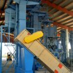 Ketten- und Eimerförderer zum Transport von Sägemehl