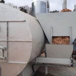 drying furnace and fuel charging tank for the furnace