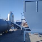 ein Sägemehlbehälter für den Trockner und eine Trockentrommel