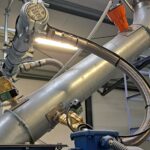 spark detection and extinguishing system on the chute pipe