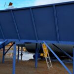 supply tank for wet sawdust for the drum dryer