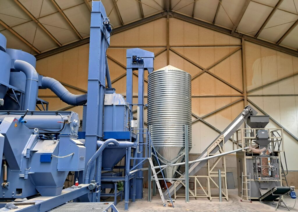 pellet production line, Munch granulator model RMP 520, pellet cooler, pellet silo, machine for packing pellets into small foil bags